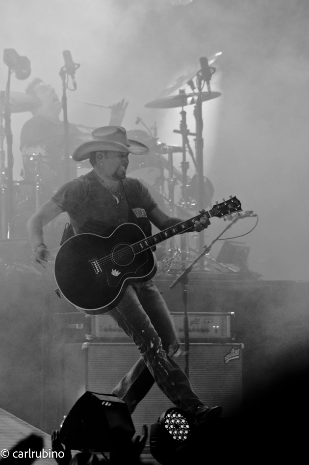 Jason Aldean, stepping through the fog at Essex Fairgrounds, Essex Junction, VT.  Snuck a camera in and got this shot before I had to hot foot it into the crowd.
